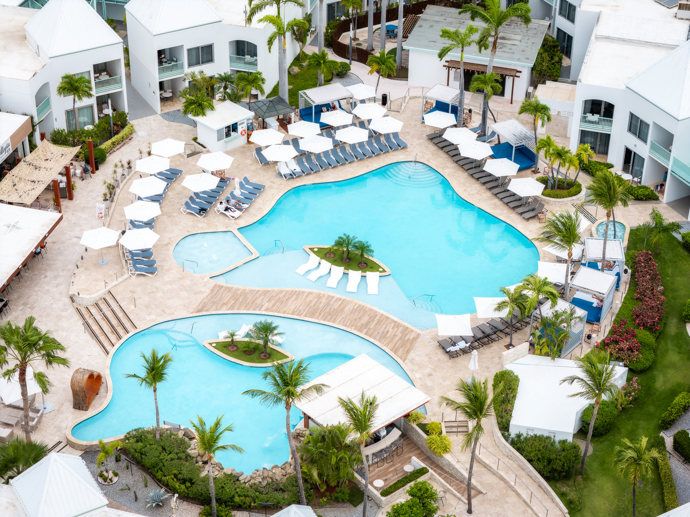 Aerial view of the two swimming pools at Courtyard Aruba