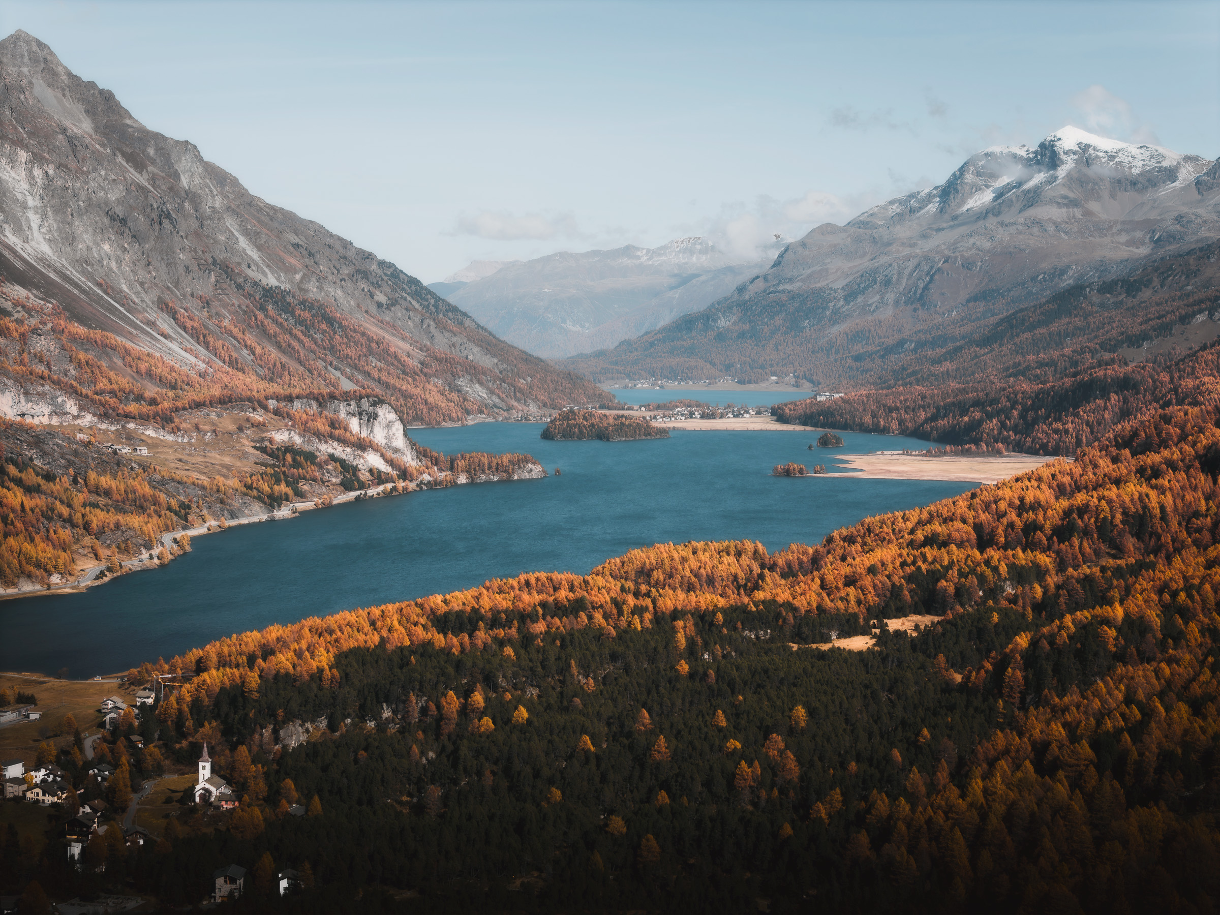 Aerial view of Lake Sils and autumn mountains in the Engadin valley